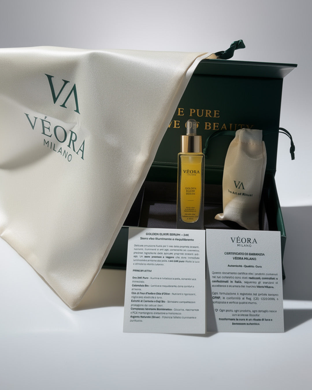 Prodotti per la cura della pelle Véora Milano con pochette di marca su una confezione biancabackground